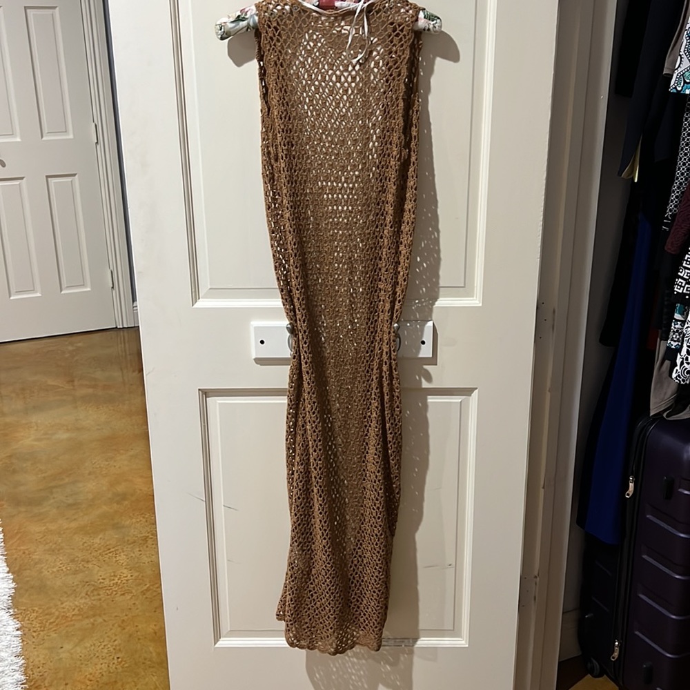 Boutique woman’s size S brown crocheted long sleeveless sweater